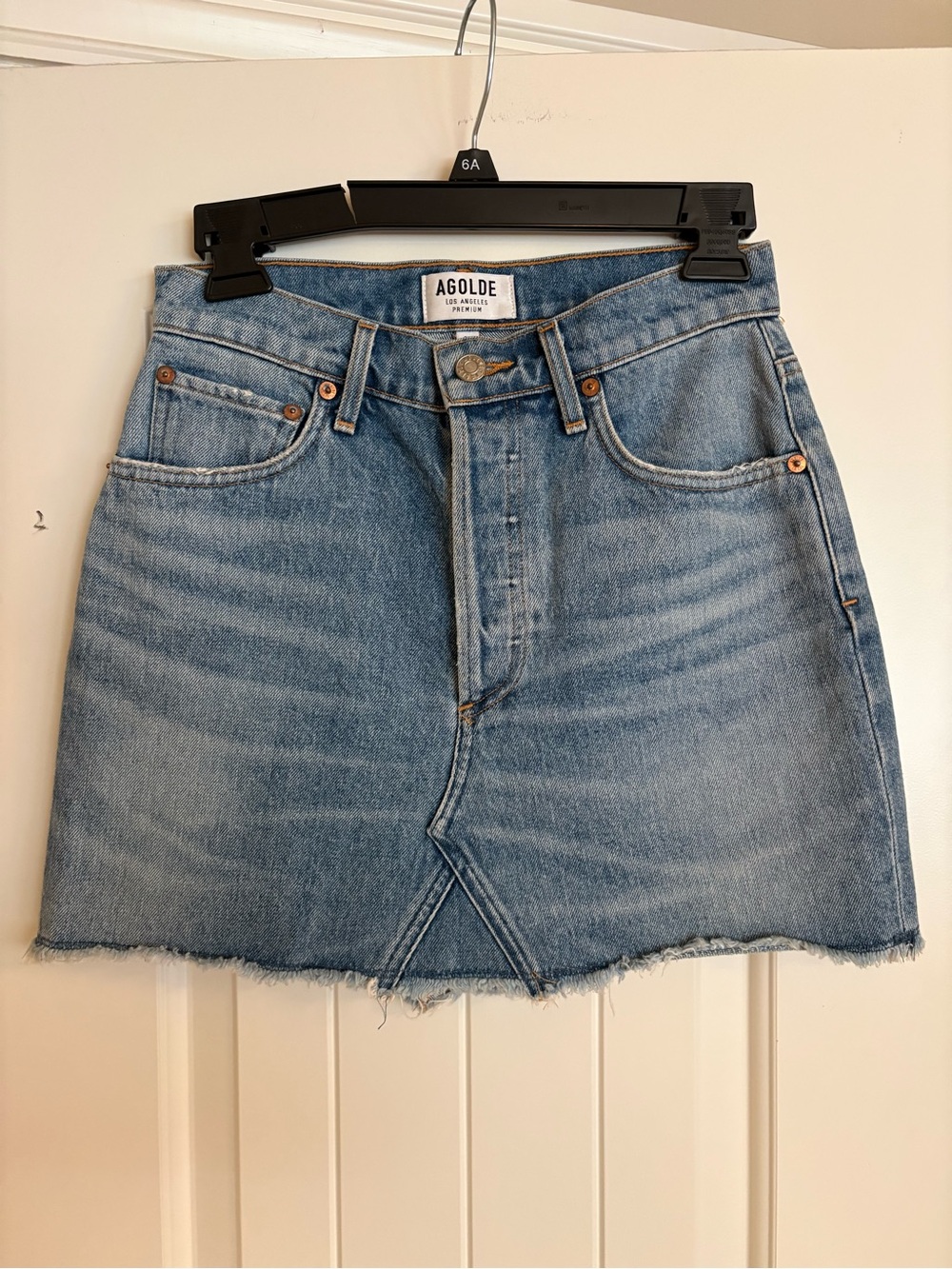 Agolde Quinn Hi Rise Mini Skirt in a light wash denim size 25